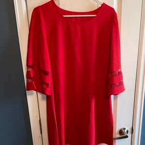 Chic Red Mini Dress with Sleeve Accents
Never Worn